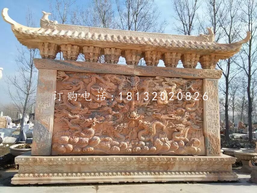 九龍影壁雕塑，晚霞紅石雕影壁